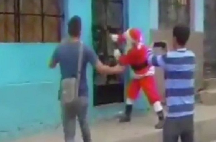 Peruvian police dressed as Santa Claus raid suspected drug house